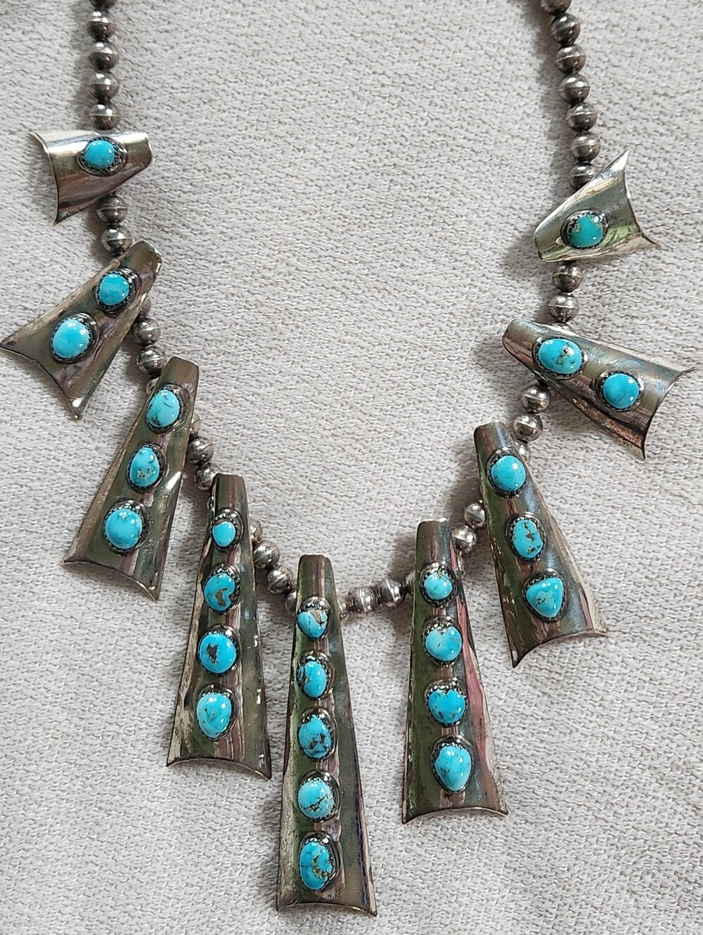 SIGNED ML NAVAJO STERLING SILVER AND TURQUOISE STATION NECKLACE